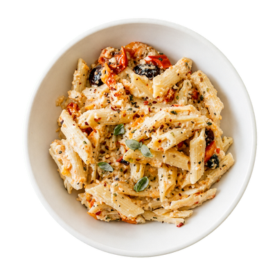 Baked Feta and Tomato Pasta | An easy baked feta pasta kit with cherry tomatoes, penne and garlic. A creamy, budget-friendly family dinner serving 5.